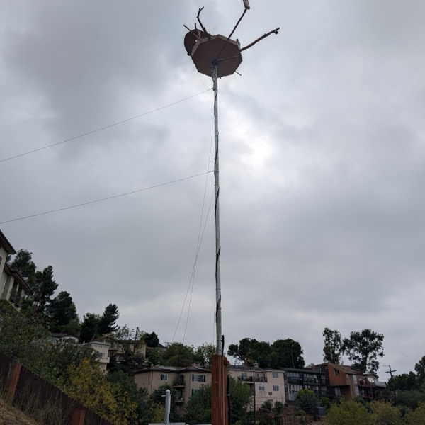 A hawk's nest on a pole above the Eastside hills